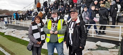 Chris Rowcroft receives his award from MSU couple Allan & Janice Gregson